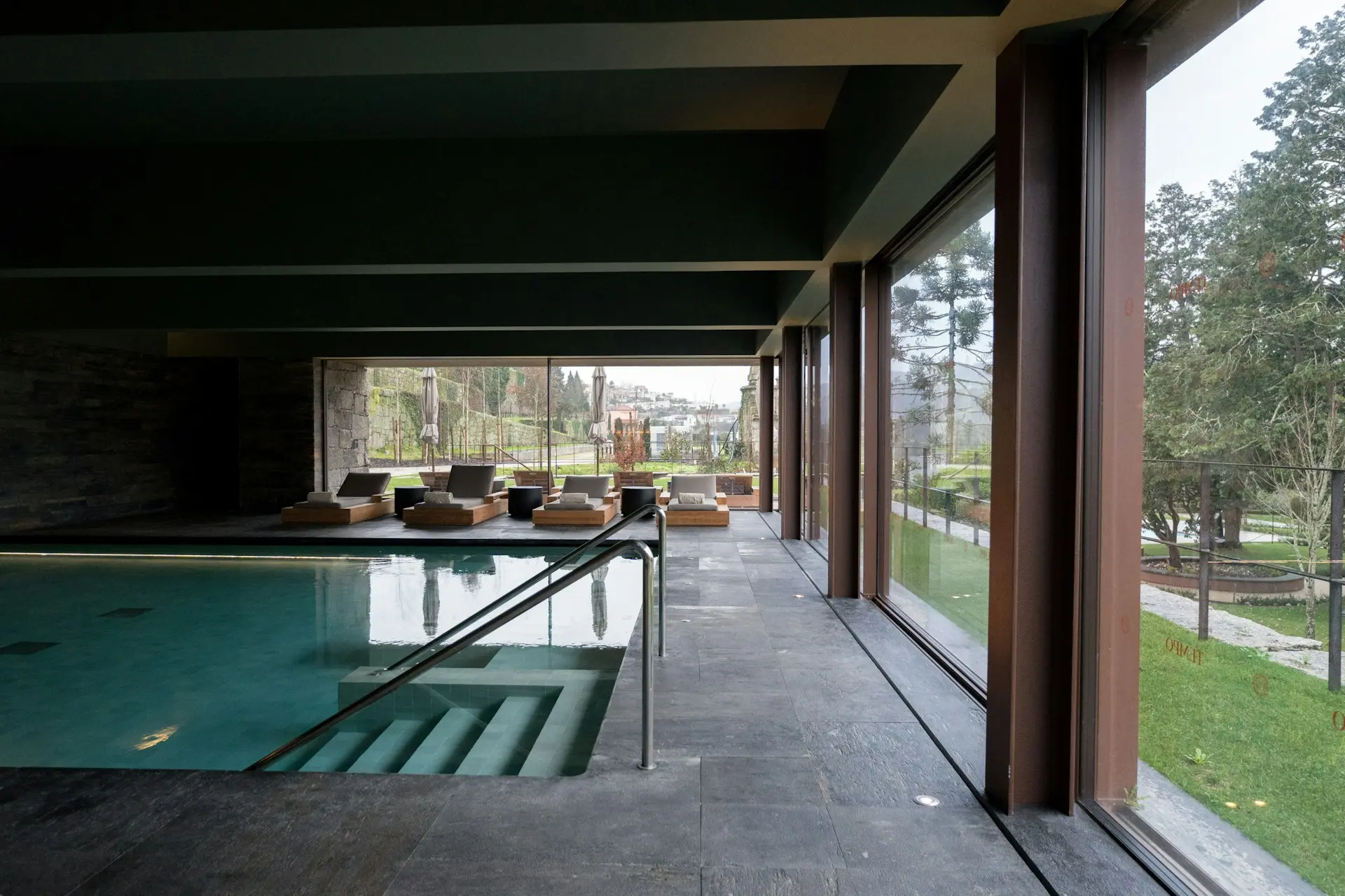 Indoor spa pool overlooking a private garden